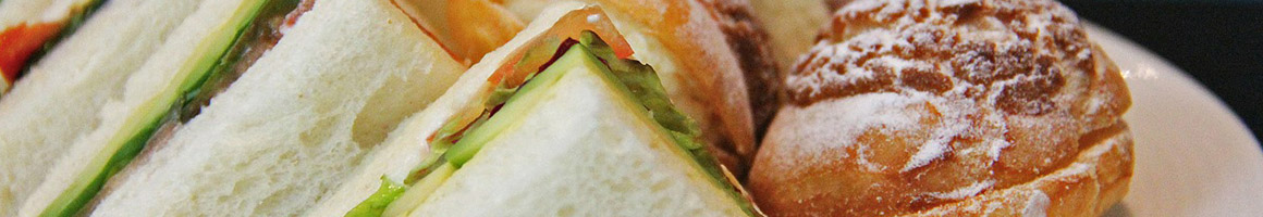 Eating Sandwich at Arizona Sandwich Co & Catering restaurant in Tempe, AZ.